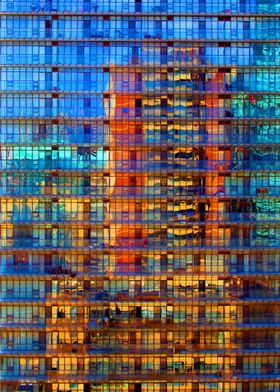 A tower block reflected in