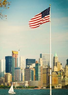 The flag and the city. Ellis Island, New York.