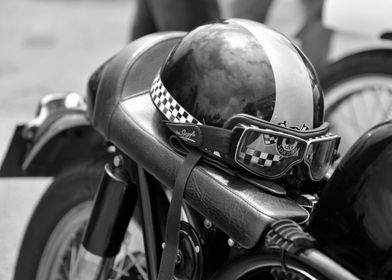 close up of a classic motorcycle helmet and goggles 