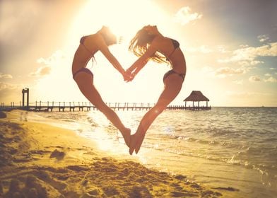 Two Young Woman Jumping In Heart.