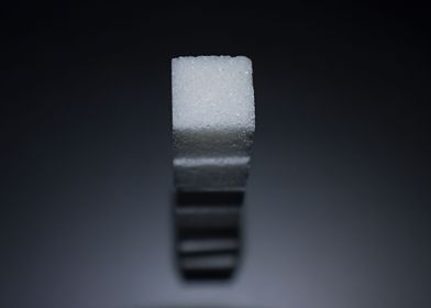 A classy macro photograph of a stack of sugar cubes. Li ... 