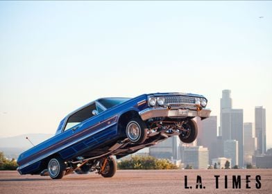 A custom 1963 Chevy Impala lowrider car is seen hopping ... 