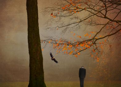 lone man  on an Autumn day on Hampstead heath Uk 
