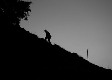 A man climbing a hill at Caracas, Venezuela.