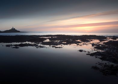 Early morning, big rockpools and Mumbles Lighthouse on  ... 