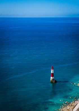 Lighthouse along Seven Sisters, England in Portrait.