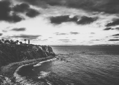 beach sunset with cloudy sky in black and white