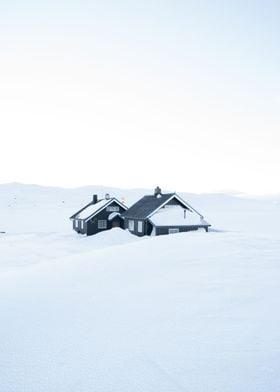 Snow covered cabin in the Norwegian mountains. 