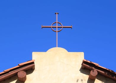 Church Cross Church top with a cross and blue sky in th ... 