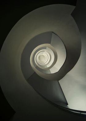 Spiral staircase in beige tones