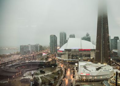 An amazing cityscape of a foggy Rogers Centre with the  ... 