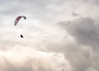 Paraglider in the clouds