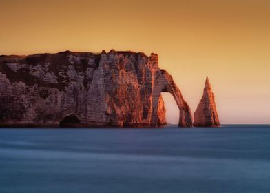 The Porte d'Aval and L'Aiguille at Etretat, a commune i ... 