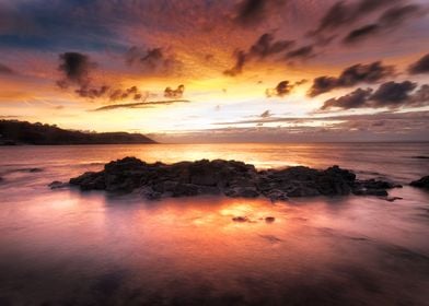 Sunrise at Langland Bay on the Gower peninsula coa