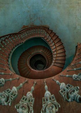 Abandoned spiral staircase. View from the top