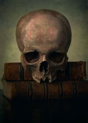 Male skull and old books