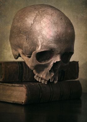 Still life with male skull and old books