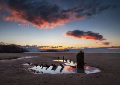 Sunset at Worms Head and the wreck of the Helvetia