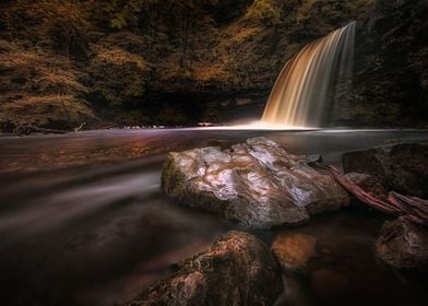 A waterfall known as Lady Falls or Sgwd Gwladus