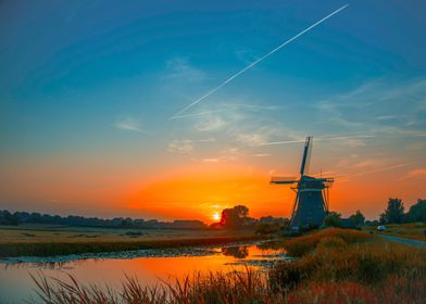Dutch windmill during sunset