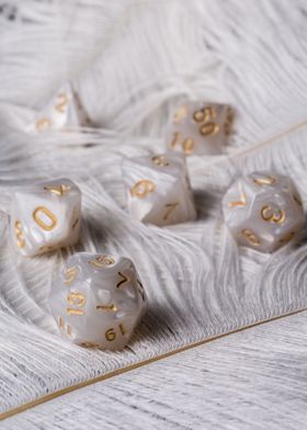 White Dice on Feather