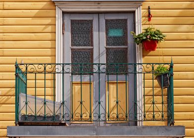 Balcony On Yellow Wall