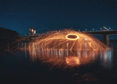 Flying Sparks in the River