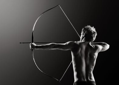 Male archer drawing bow