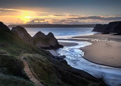 Sunset at Three Cliffs Bay