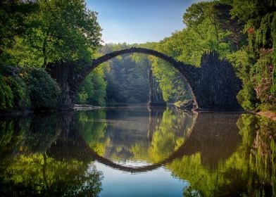 Arching Bridge Over River