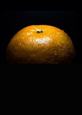Fresh orange in spot light