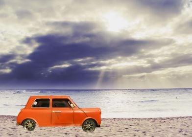 orange car on the beach