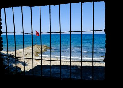 Turkey flag behind bars