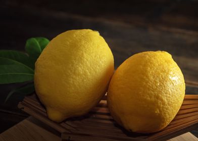 Fresh Lemon on Wood Plate