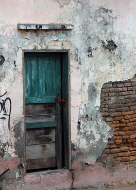 Wood Door in a Brick Wall