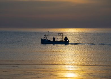 Fishermen at sunrise