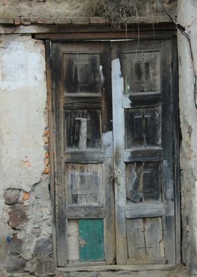 Old Wooden Door in a Wall