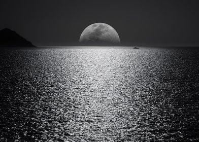 Moonset On Open Ocean