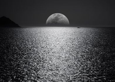 Moonset On Open Ocean