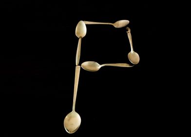 Letter P made of spoons 