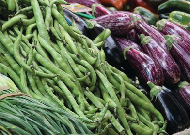 Aubergine and peas market