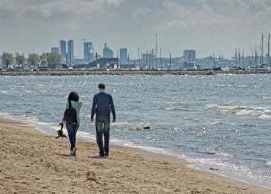 Couple Walking On A Beach