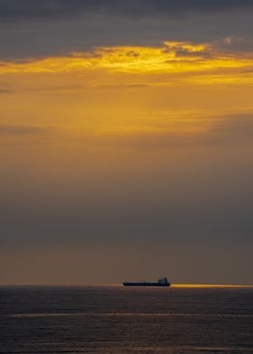 Tanker vessel at sunrise