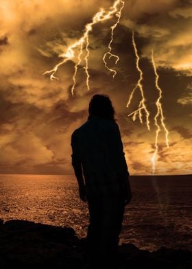 woman looks out at storm