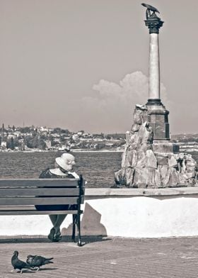 Woman with newspaper