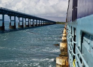 Train on bridge over sea