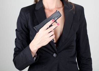 Woman holds handgun