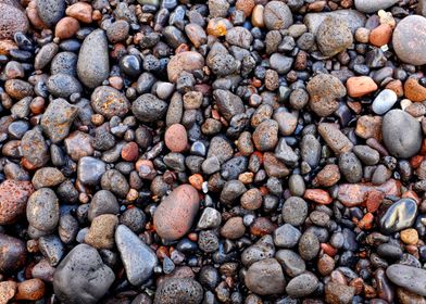 Wet volcanic pebbles