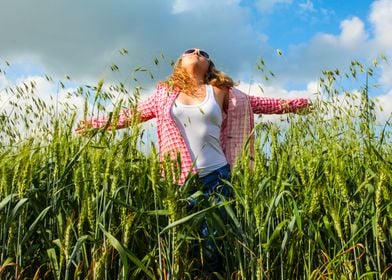 teen girl in a wheat field