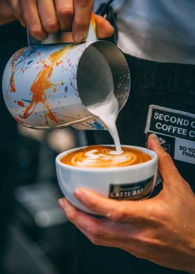 Person pouring coffee